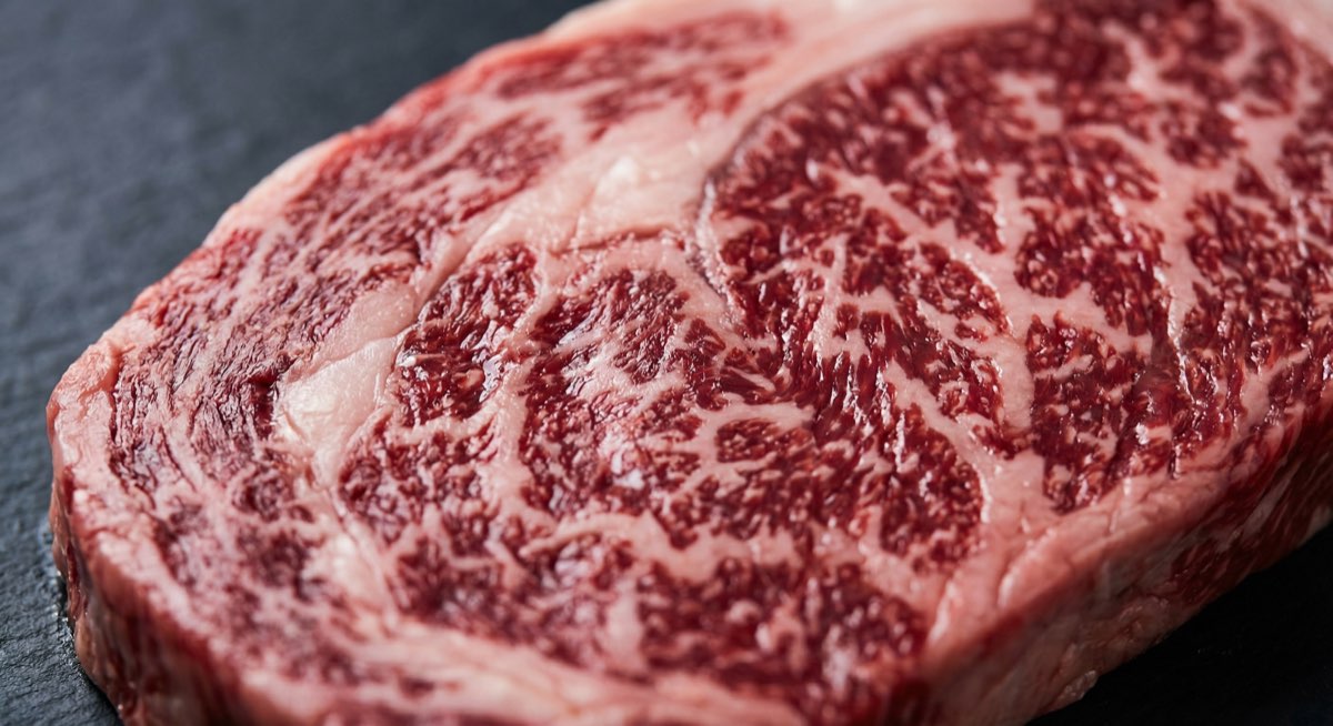 Close-up of wagyu marbling pattern showing intramuscular fat distribution
